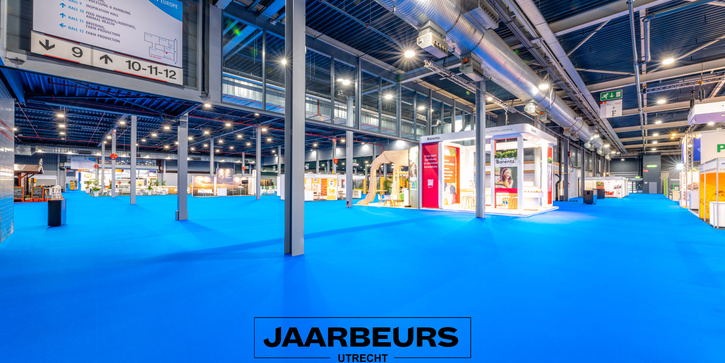big event hall Jaarbeurs Utrecht with aqua blue sustainable carpet flooring